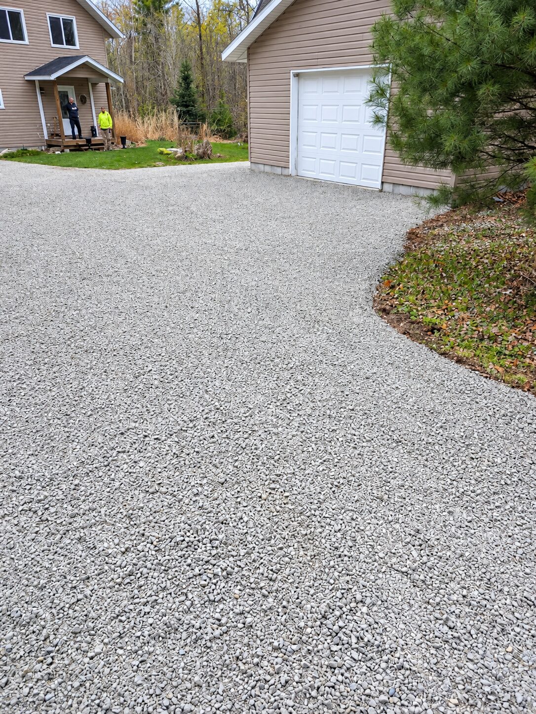 Newly built gravel driveway and turnaround at a country home