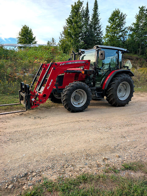 Tractor working on rural property maintenance